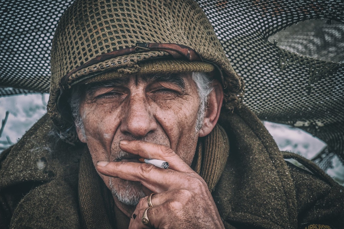 Portrait Winner October - An old soldier posing for a photo smoking